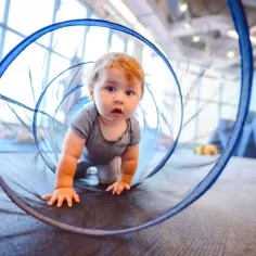 baby in tunnel