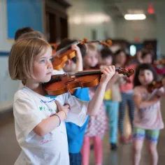 children playing violins